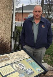 Michael Cooper stands by Cecilton historical plaque